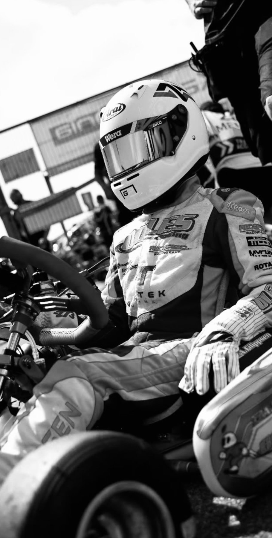 Driver on track, in action